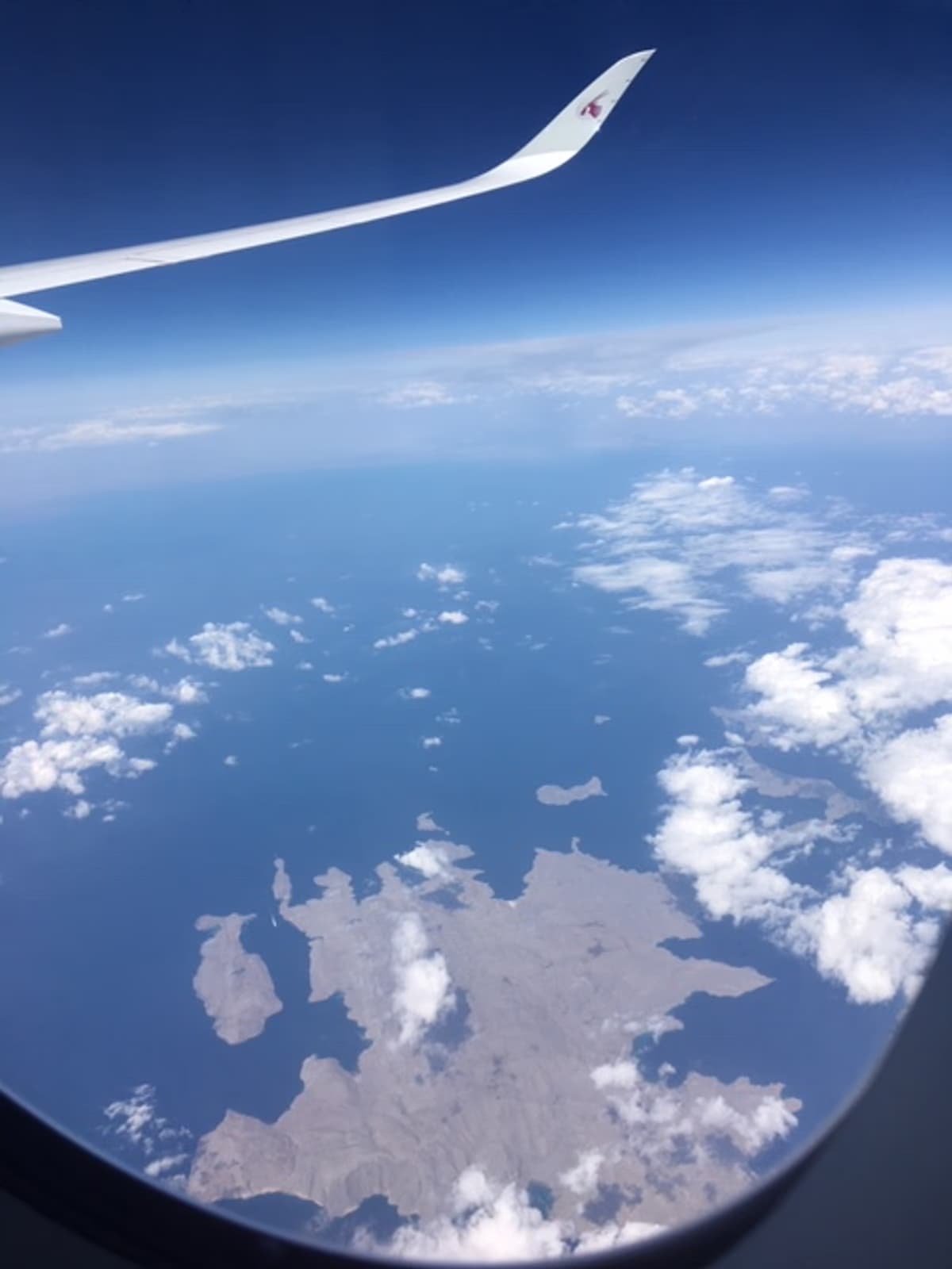 Aerial photograph of the Strait of Hormuz between Iran and Oman taken from 35,000 feet altitude