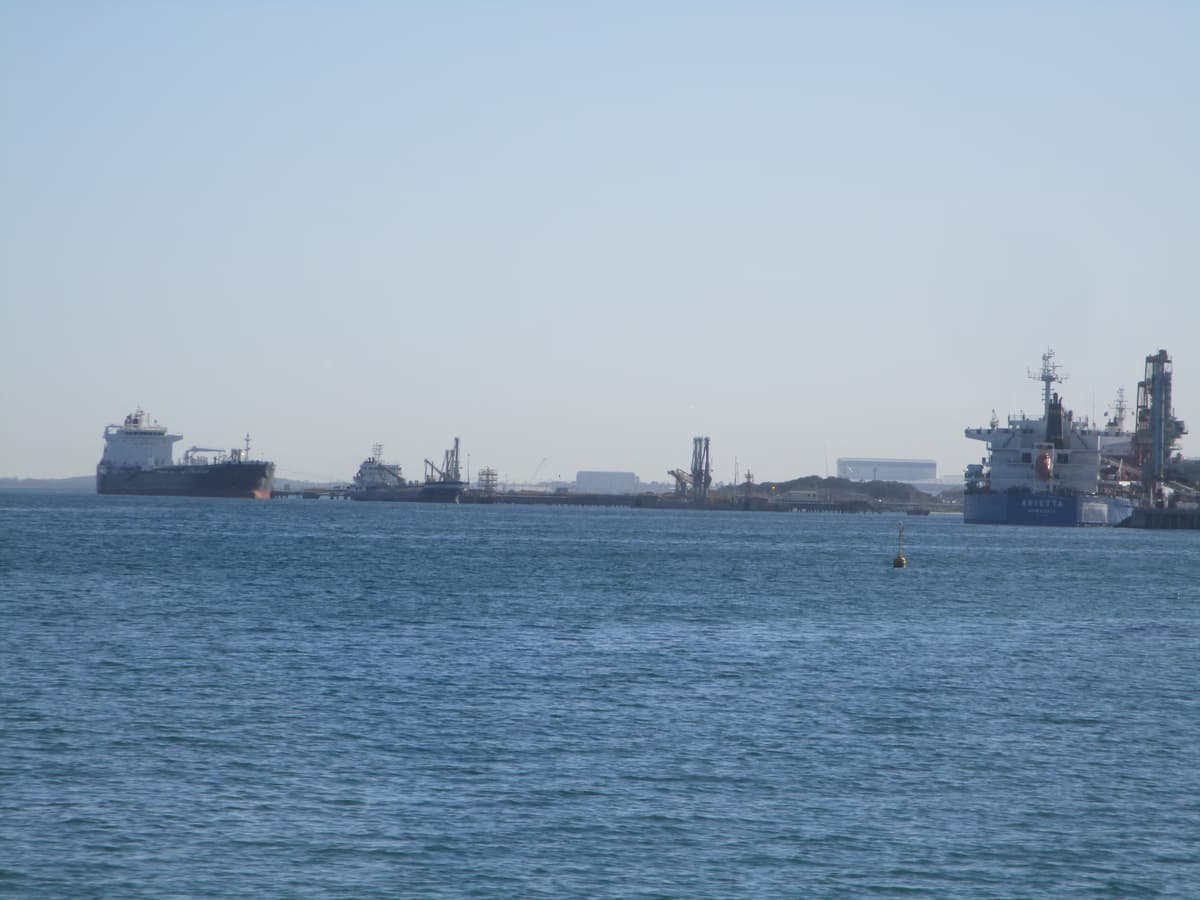 BP oil refinery jetty at Kwinana Western Australia with tanker vessels moored at industrial berth