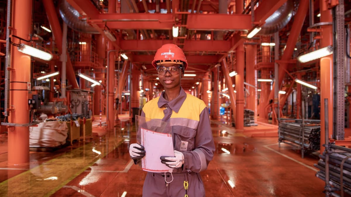 Eni SpA energy operations worker on offshore gas vessel deck in global operations