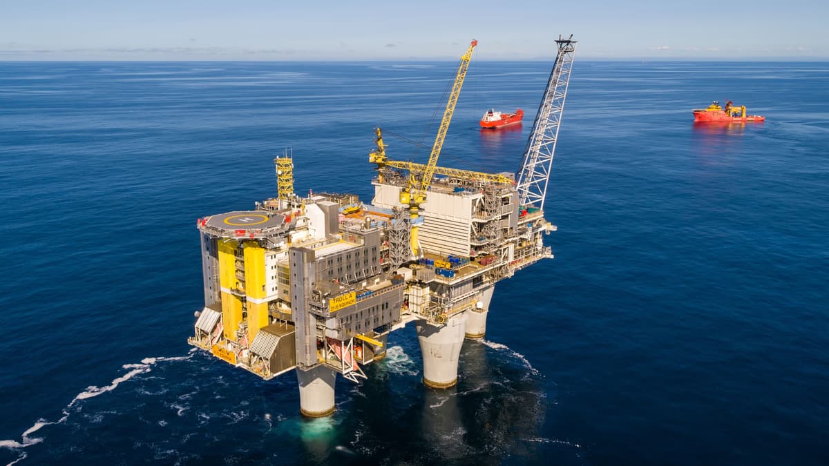 Troll A gas platform in the North Sea viewed from above with supply vessels nearby