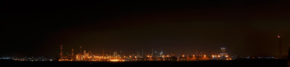 SATORP Saudi Arabia oil refinery complex illuminated at night near Jubail
