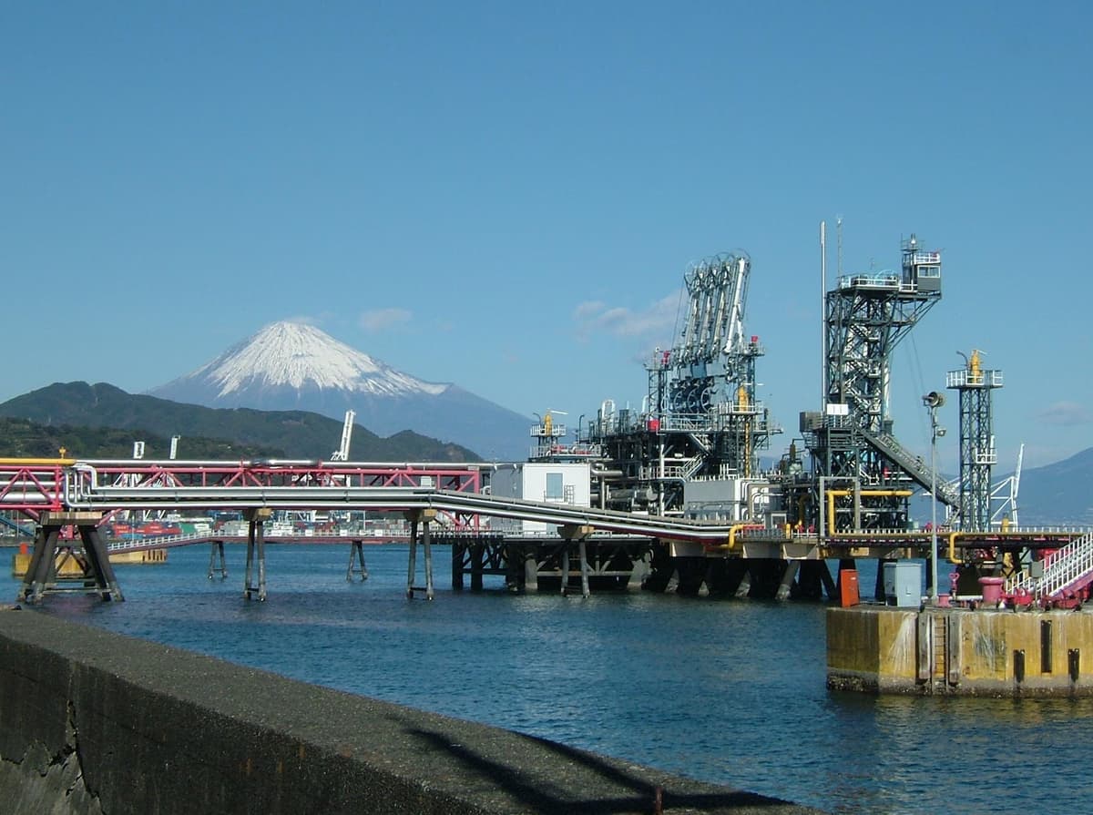 LNG unloading arm at Shimizu port in Japan with Mount Fuji in the background