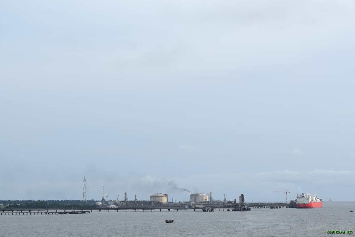 LNG terminal industrial facility on the Bonny River in Rivers State Nigeria with offshore vessels