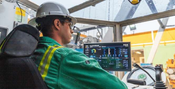 Aerial view of a drilling rig on a North American well pad