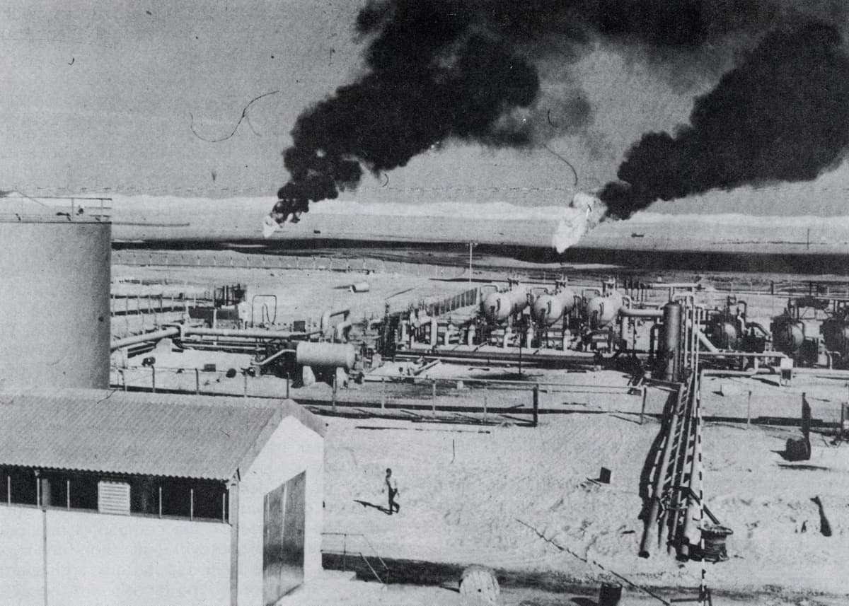 Aerial view of a Libyan crude oil production facility showing storage tanks and oilfield infrastructure, photographed in 1973