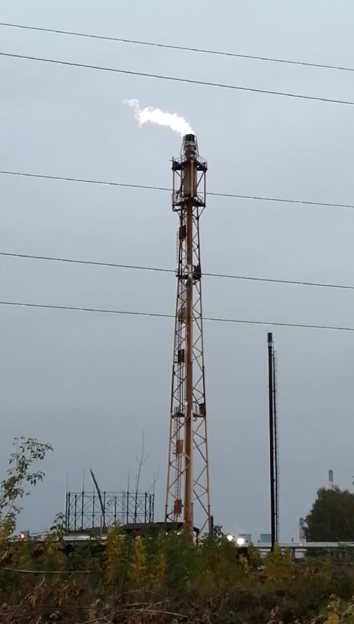 Gas flare burning at the Ryazan oil refinery complex in western Russia