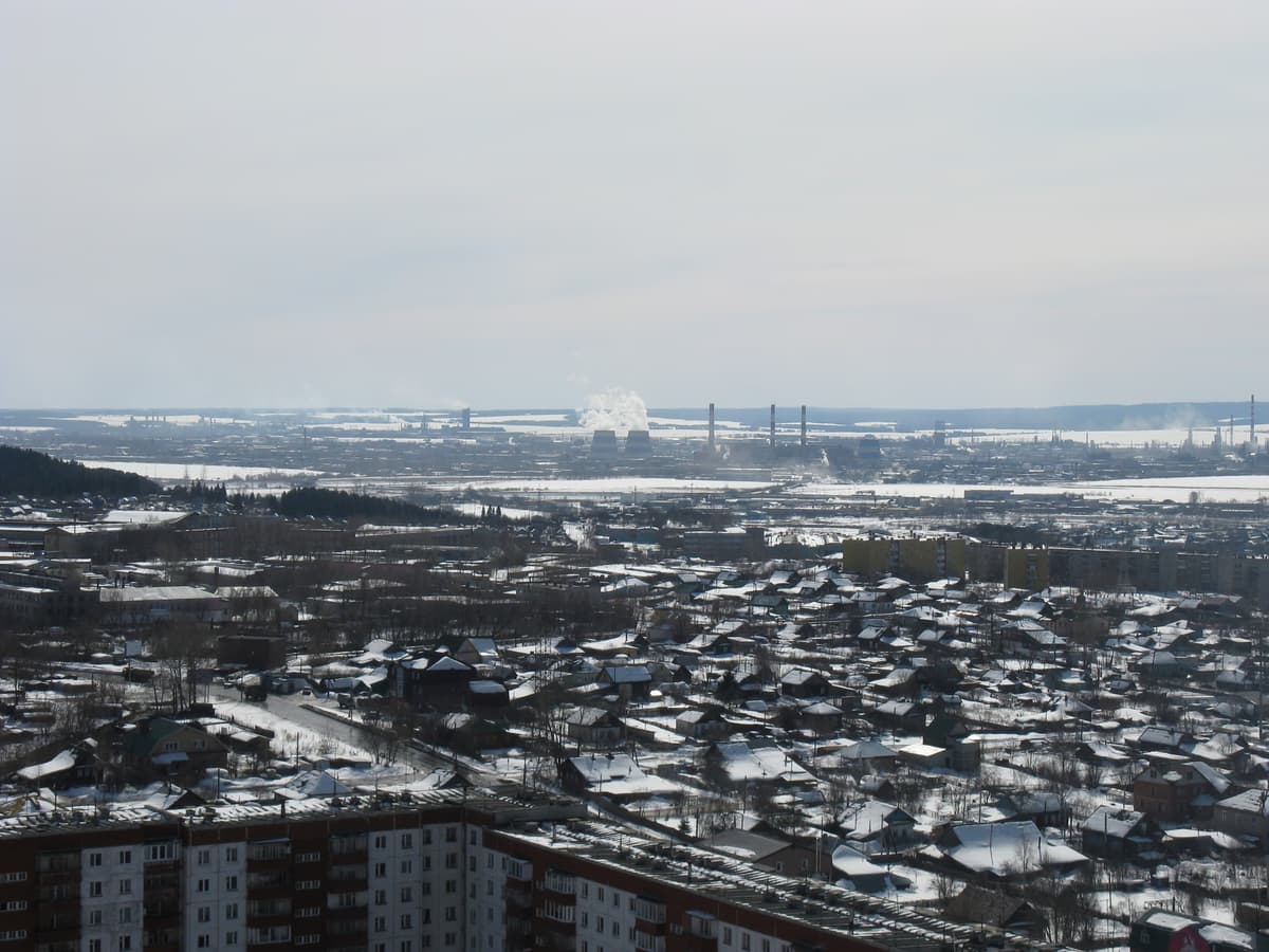 Lukoil Permnefteorgsintez oil refinery and power plant complex in Perm, Russia, with processing units and stacks