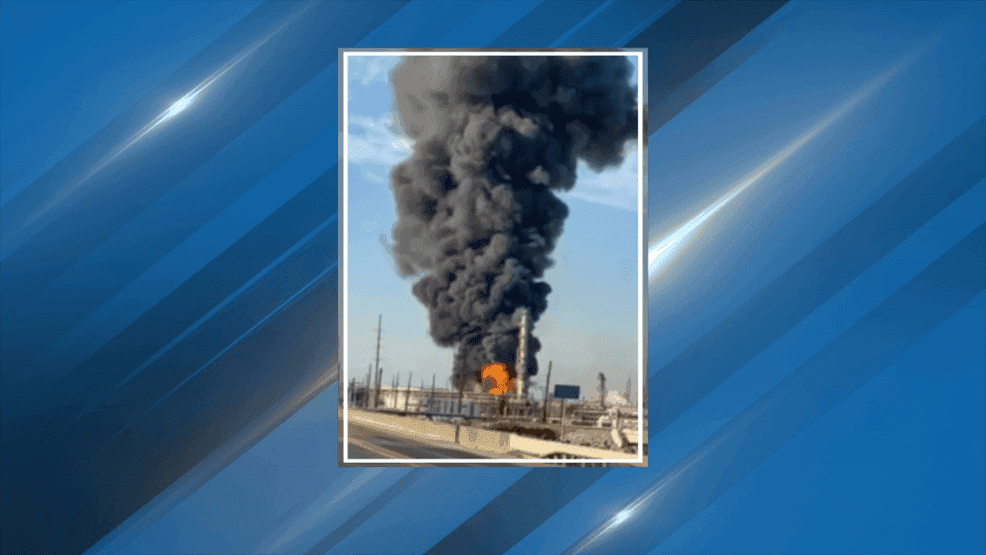 Smoke and fire rise from the Valero Port Arthur refinery following an explosion on March 23, 2026