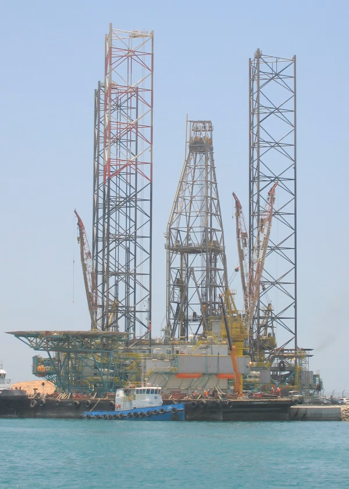 Jack-up drilling rig at Mena Zayed port in Abu Dhabi United Arab Emirates