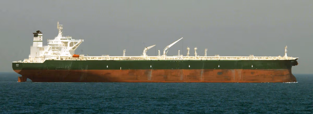U.S. Navy helicopter escorts VLCC crude oil tanker AbQaiq through the Persian Gulf 2003