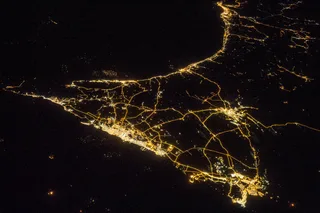 Nighttime view of the United Arab Emirates from the International Space Station showing city lights