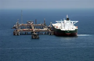 Oil tanker loading crude at Al Basrah Oil Terminal in the Persian Gulf