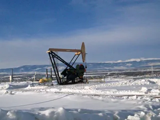 Pump jack oil well operating in Duchesne County Utah in the Uinta Basin