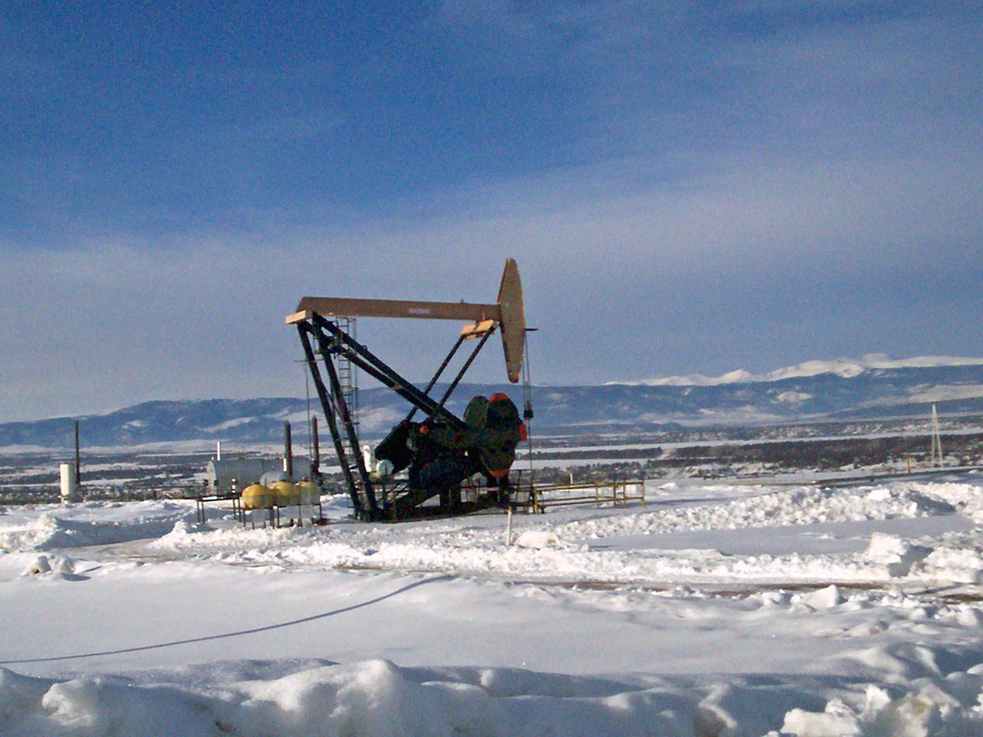 Pump jack oil well operating in Duchesne County Utah in the Uinta Basin