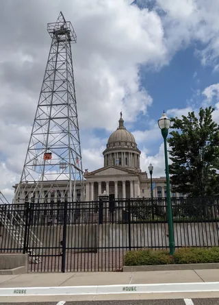Active oil drilling rig operating on the south lawn of the Oklahoma State Capitol building in Oklahoma City