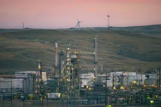 Sinclair refinery in Casper Wyoming at sunrise with distillation towers and processing units visible