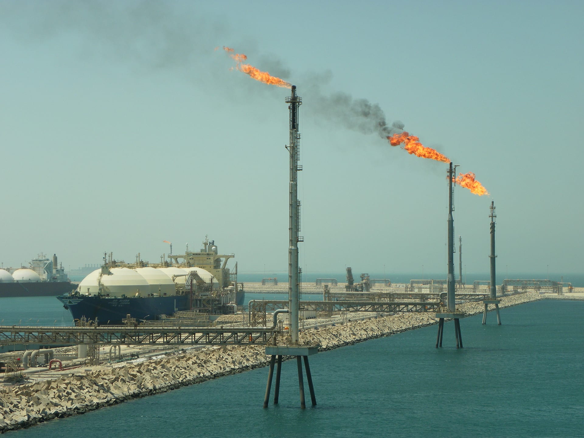 Ras Laffan LNG terminal in Qatar showing gas processing and liquefaction trains along the Persian Gulf coastline