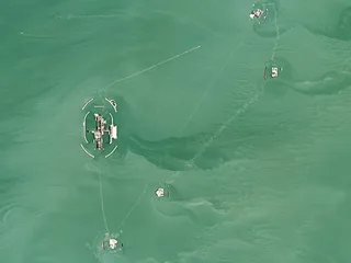Aerial satellite view of Kashagan oil field artificial islands and production infrastructure in Kazakhstan's Caspian Sea