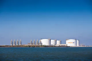 Aerial photograph of the Golden Pass LNG export terminal at Sabine Pass, Texas, showing liquefaction trains and marine berths