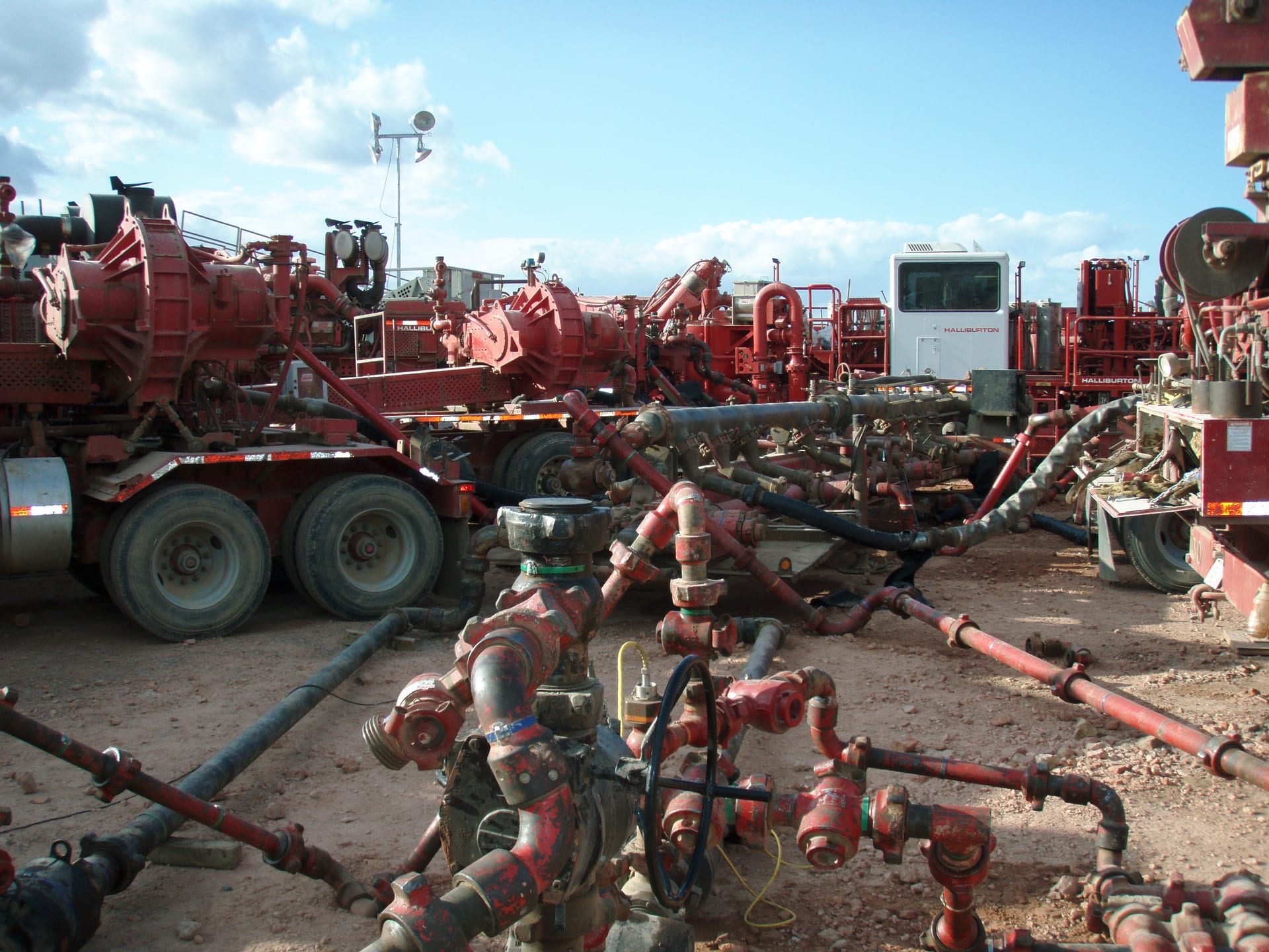 Halliburton completions crew and equipment at a hydraulic fracturing operation in the Bakken formation