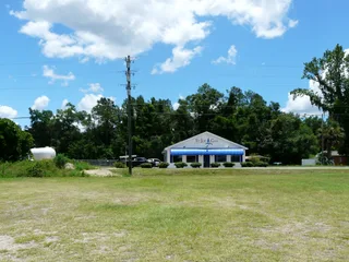 Natural gas storage facility with above-ground tanks and infrastructure at a gas company in Florida