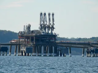Cove Point LNG Terminal marine loading pier with industrial loading arms on the Chesapeake Bay in Maryland