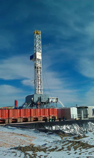 Drilling rig at work on a well pad in the Williston Basin Bakken Formation, North Dakota