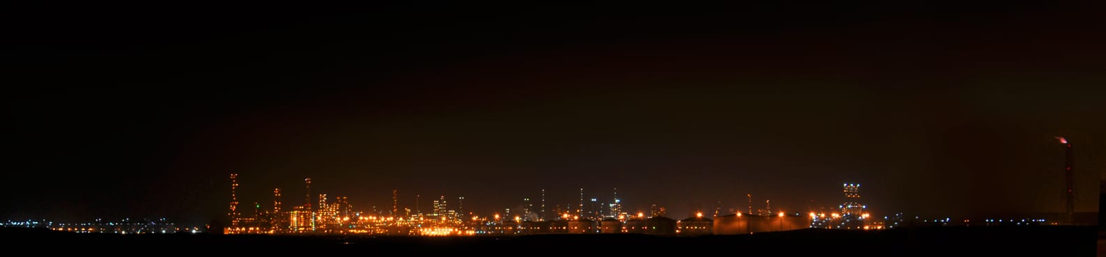 SATORP Saudi Arabia oil refinery complex illuminated at night near Jubail