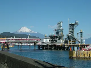 LNG unloading arm at Shimizu port in Japan with Mount Fuji in the background