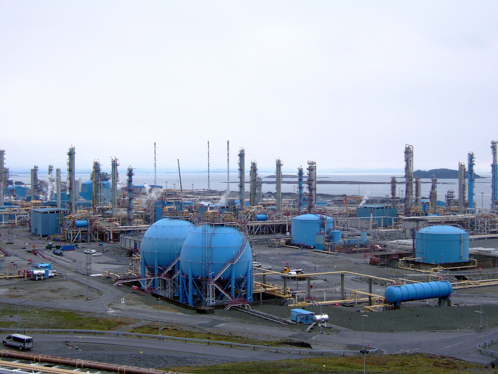 Aerial view of the Kårstø gas processing plant on the Norwegian coast beside the fjord