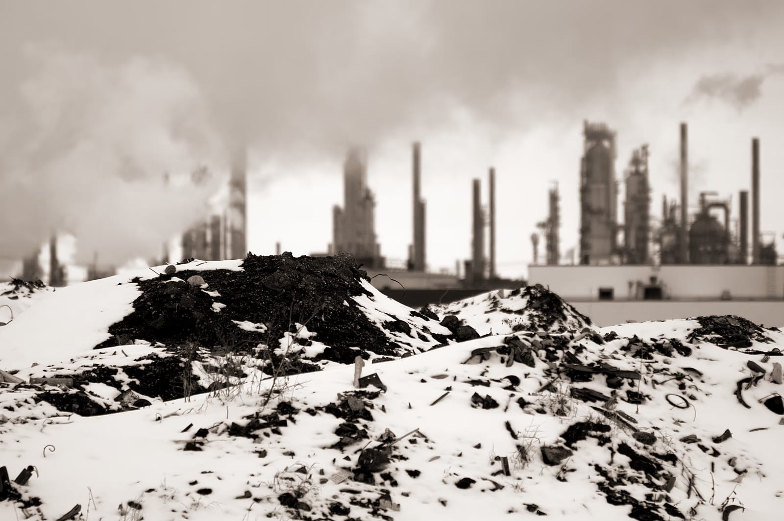 Alberta oil refinery processing towers and storage tanks in evening light, April 2011