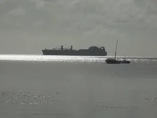 Large oil tanker vessel underway at sea off the coast of Saipan, 2014