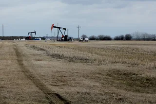 Multiple pumpjacks operating at the Leduc-Woodbend Oilfield in Alberta, Canada