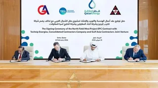 QatarEnergy and Technip Energies executives signing North Field West LNG EPCC contract in Doha Qatar