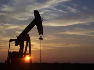 Oil pump jack extracting crude oil from a light oil producing well in a North American basin