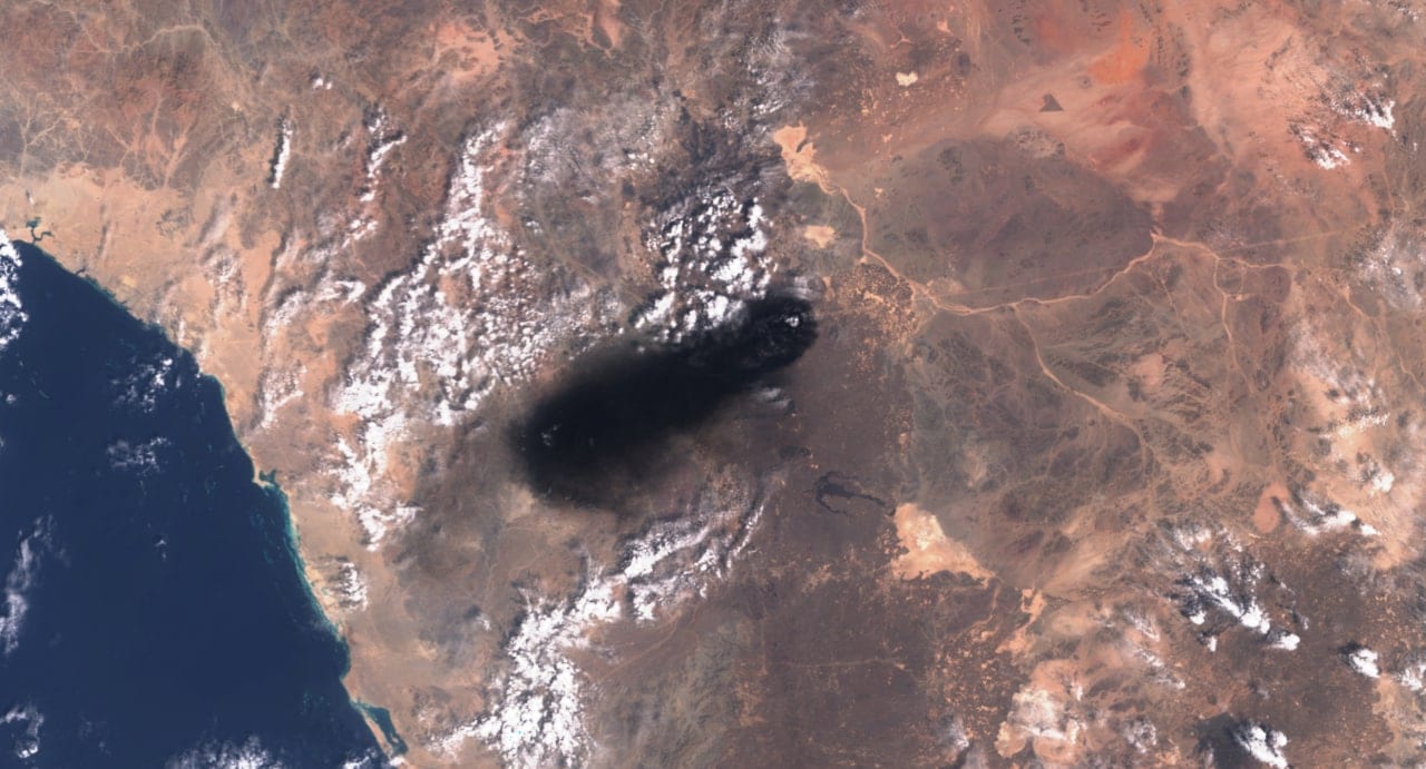 Satellite view of smoke rising from Saudi Arabia's East-West crude oil pipeline