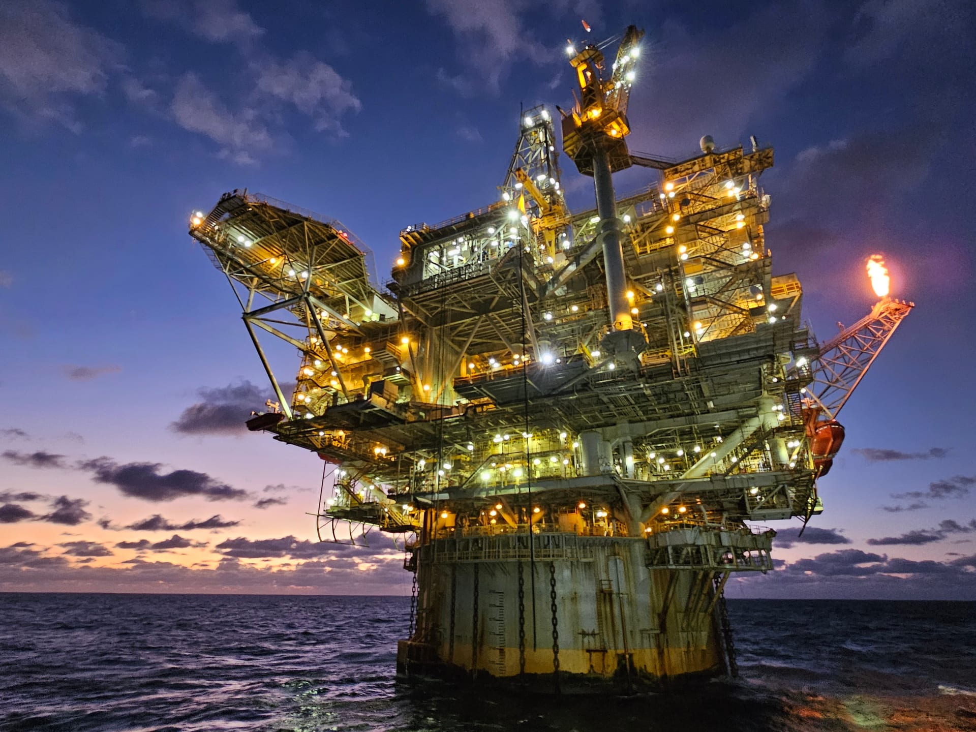 Offshore oil platform Holstein at dusk in the Green Canyon area of the Gulf of Mexico