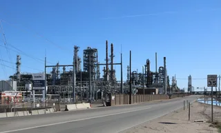 Suncor Energy refinery complex on Brighton Boulevard in Commerce City Colorado with distillation towers and processing units