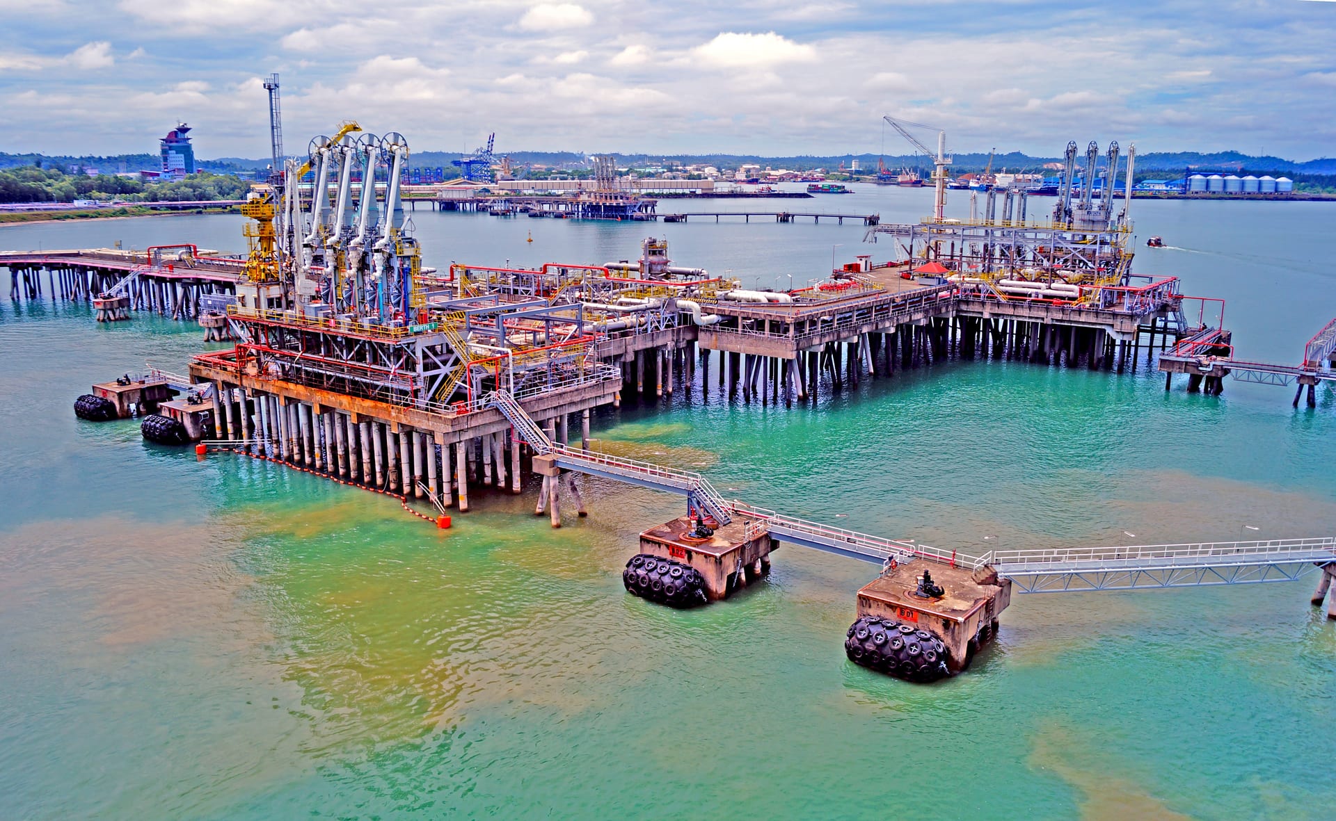 Marine loading arms at the Bintulu LNG export port facility in Sarawak, Malaysia