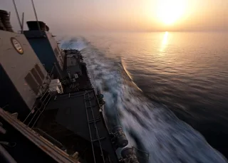 USS Porter guided-missile destroyer navigating the Strait of Hormuz during a maritime security patrol in the Persian Gulf